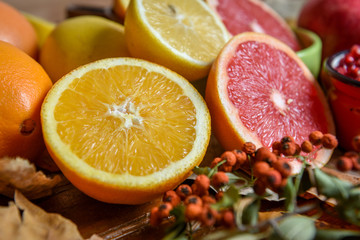 Oranges and grapefruit on a table in a vintage style