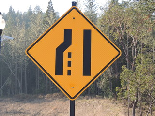 Traffic sign warning of lane merge