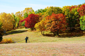 The tourists on the autumn steppe.