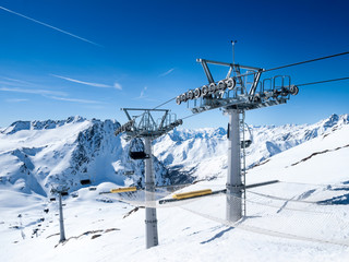 Chairlift in the Italian Alps. Ski resort Maso Corto.