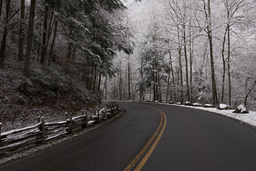 Curvy road through snow covered forest in Great Smoky Mountains National Park