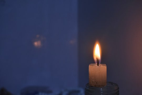 mignight glowing candle
