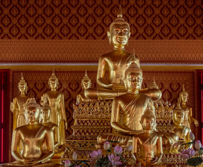 Golden statues at the Wat Phra Phiren Buddhist Temple in Bangkok Thailand