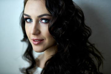 Portrait of a beautiful girl with fir wreath on his head. Magic. Amazing woman portrait. Beautiful girl with long hair.