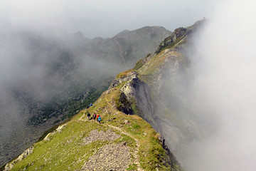 Hikers in a beautiful landscape in the mountains
