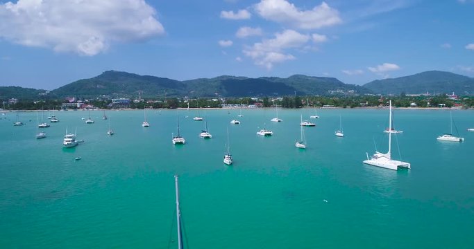 Aerial: Flying over the boats in the bay. Phuket. Thailand. Chalong pier