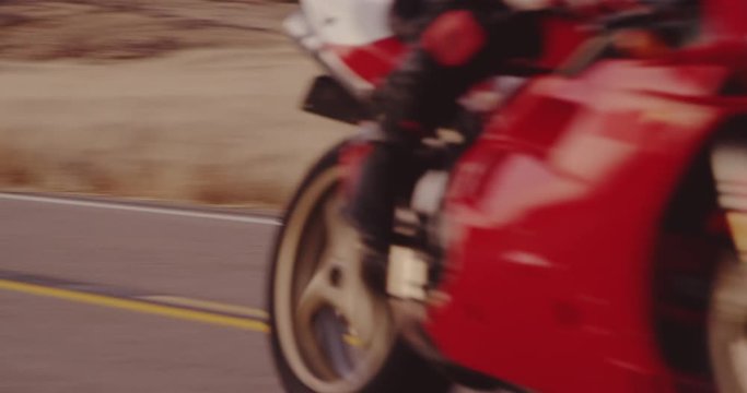 Slow Motion Extreme Motorcyclist Riding Sport Bike On Rural Country Road