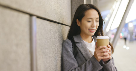 Woman feeling cold and drink of coffee