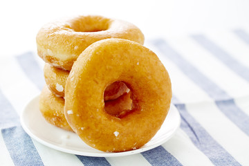 Donut isolated on a white plate