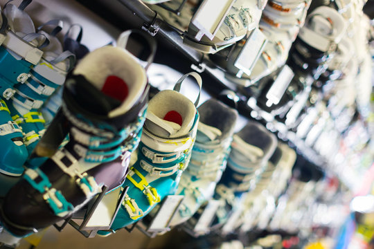 Photography of colorful ski boots on showcase