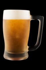 Glass mug with beer isolated on black background
