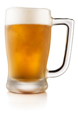 Glass mug with beer isolated on white background
