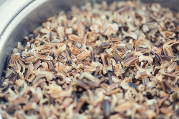 A pot with steamed black rice close-up