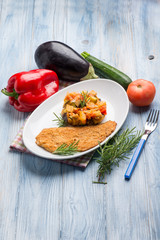 breaded fish fillet with caponata