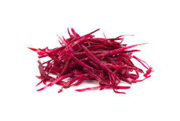 grated beets on a white background