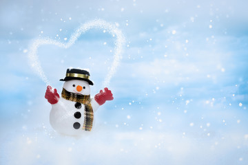 Happy snowman is standing in winter christmas landscape