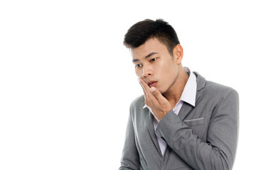 Portrait of a business man having a toothache. Isolated on white background