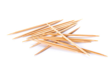 Wooden toothpicks on white background