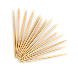 Wooden toothpicks on white background