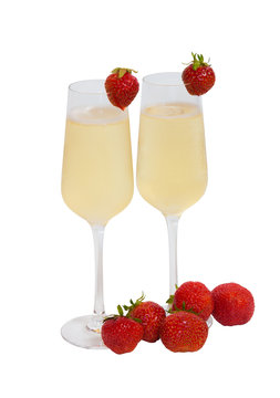 Two glasses of champagne and fresh strawberry isolated on white background