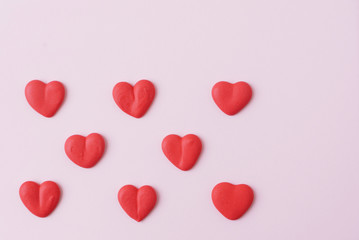 sugar hearts on pink background