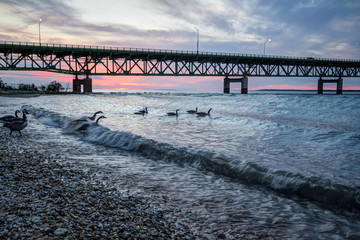 Under Mackinaw. Buried beneath the Straits of Mackinaw lies the controversial Pipeline Number 5. Opponents claim the aging oil line threatens the largest freshwater system in the world. © ehrlif
