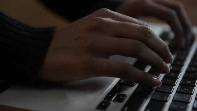 Woman Typing on Keyboard