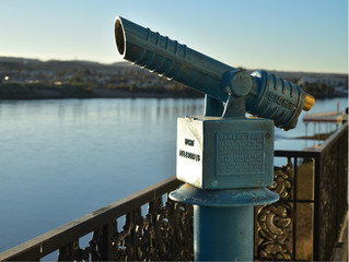 vintage coin operated telescope river view