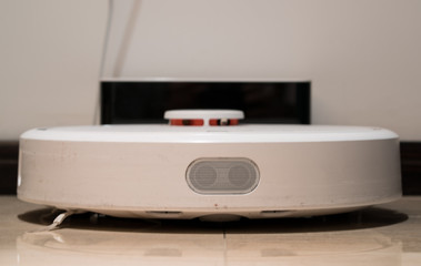 Generic white robotic vacuum cleaner front view