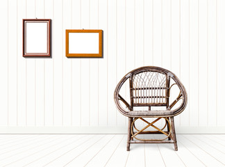 old chair on white wooden wall