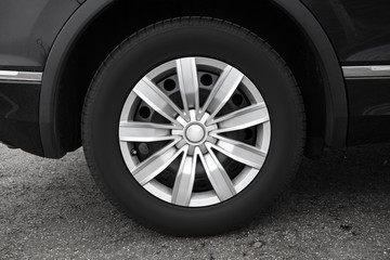 Modern car wheel, close-up photo