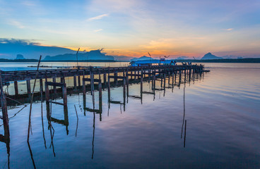 Fototapeta premium Bansamchong fishing village in Phang Nga province. the fishing village is inside the pine forest and mangrove forest. in front of Bansamchong fishing village have pier for transport to Andaman sea.