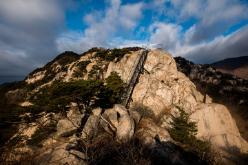 Rocky peak with steel ladder