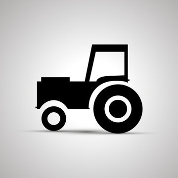 Tractor silhouette, side view simple black icon