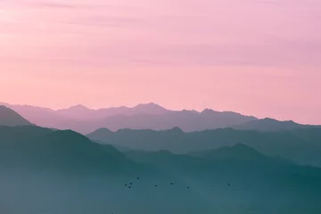 Fototapete Rund Mountain range at sunrise light © vvvita