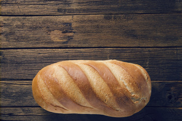 white bread on a wooden table