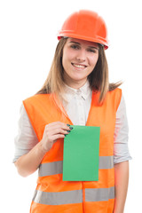 Happy engineer woman with empty paper card