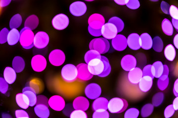 Abstract bokeh lights orange green red colorful background