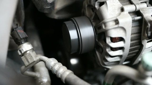The alternator belt. Running engine 