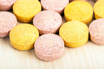 colored tablets of multivitamins
