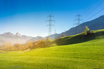 Scenic View of Mountain  and  electric pole Against blue Sky