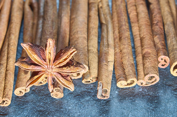 anise on cinnamon background