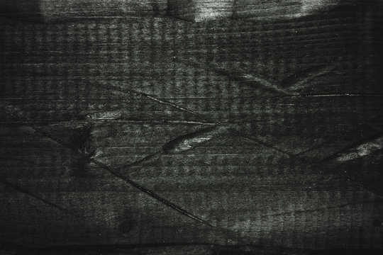 Rough texture of the wooden surface. Background in grunge style. Dark style. Black and white photography