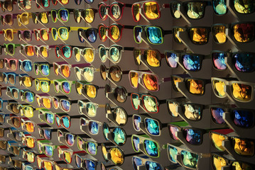 Fototapeta premium Many different sunglasses at the sale