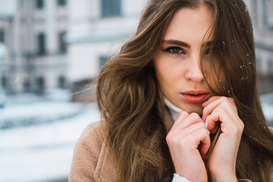 Sensual woman on winter street