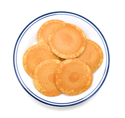 A stack of plain pancakes on a white background.