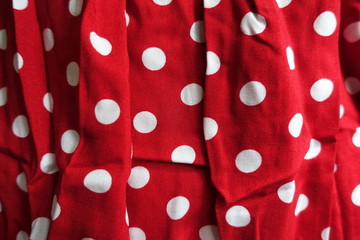 Folded red cotton with polka dot pattern