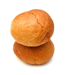 Freshly baked loaf of bread, hot and steaming on white 