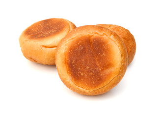 Freshly baked loaf of bread, hot and steaming on white 