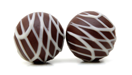 Chocolate candies collection. Beautiful Belgian truffles isolated on white background